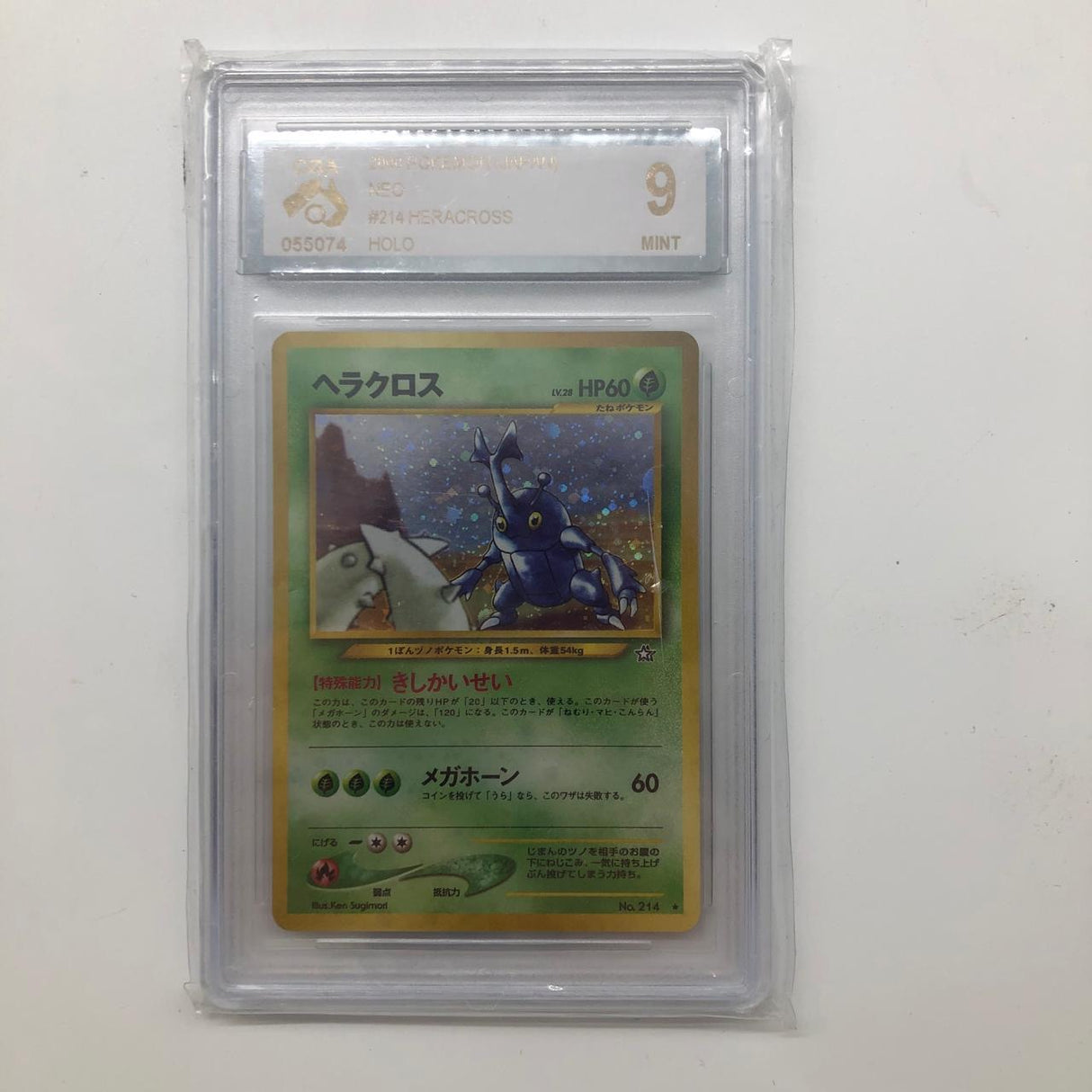 Heracross Pokemon Card No. 214 Neo Genesis Set CGA Graded 9 Japanese