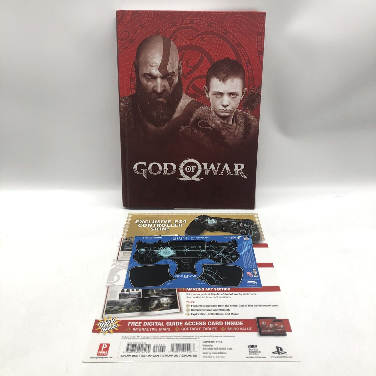 God of War Strategy Guide Collector’s Guide by Prima Games + Controller Sticker